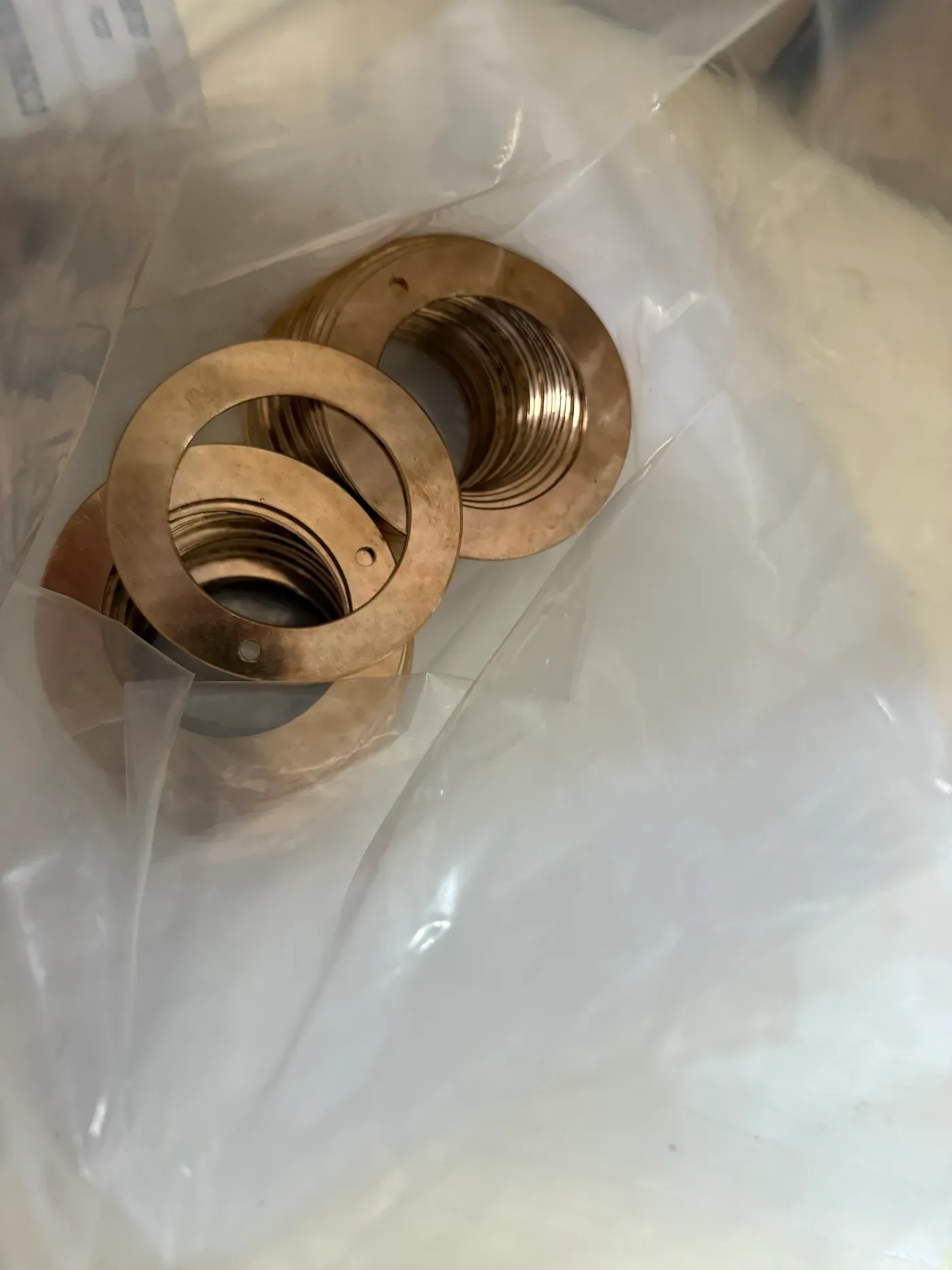 Bronze thrust washers bagged after machining